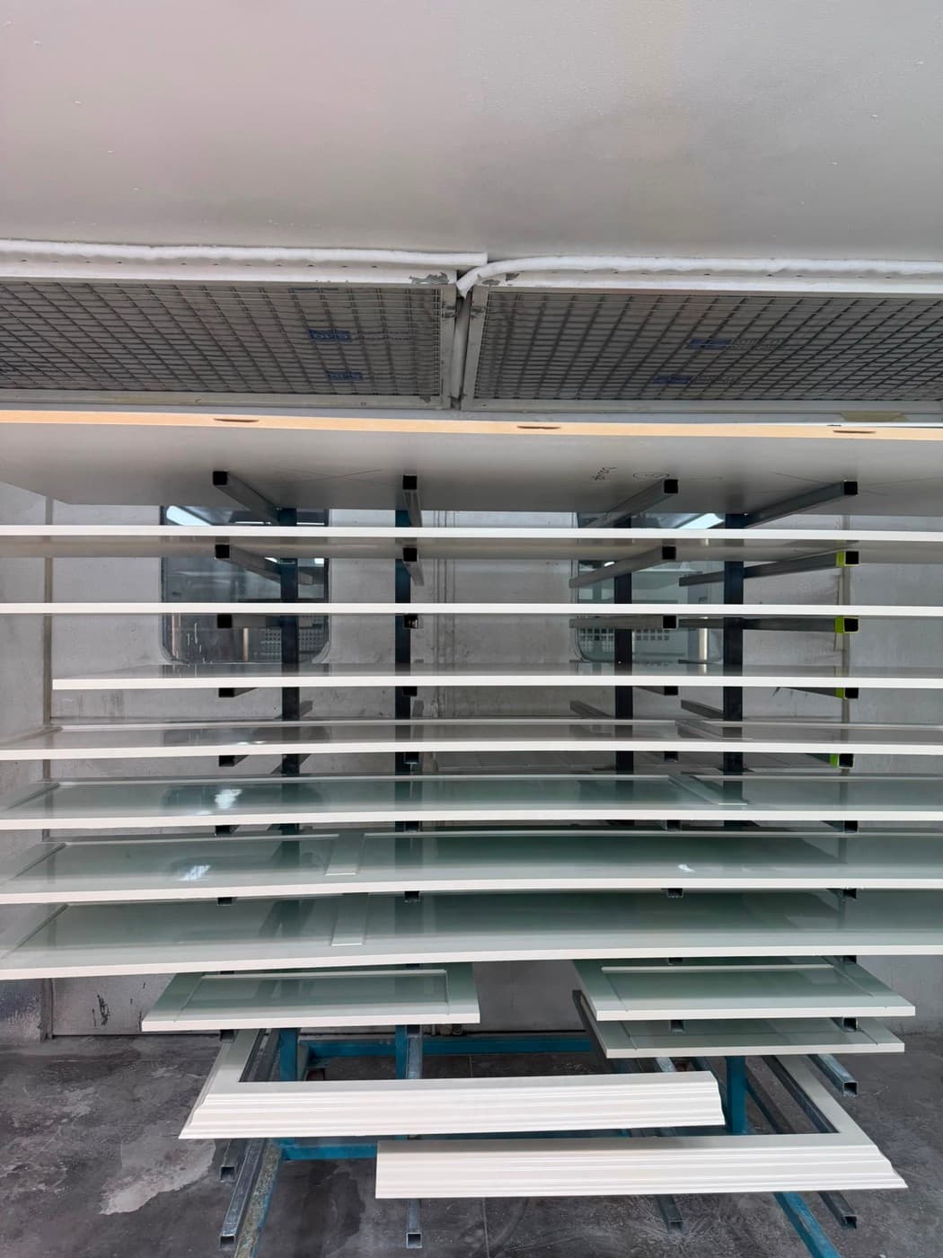 Architraves and skirting sprayed in 2-pac on the drying rack